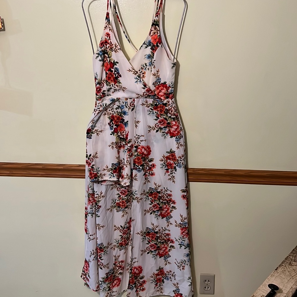 Francesca’s Miami brand. size: Small. Floral romper with skirt overlay Worn once